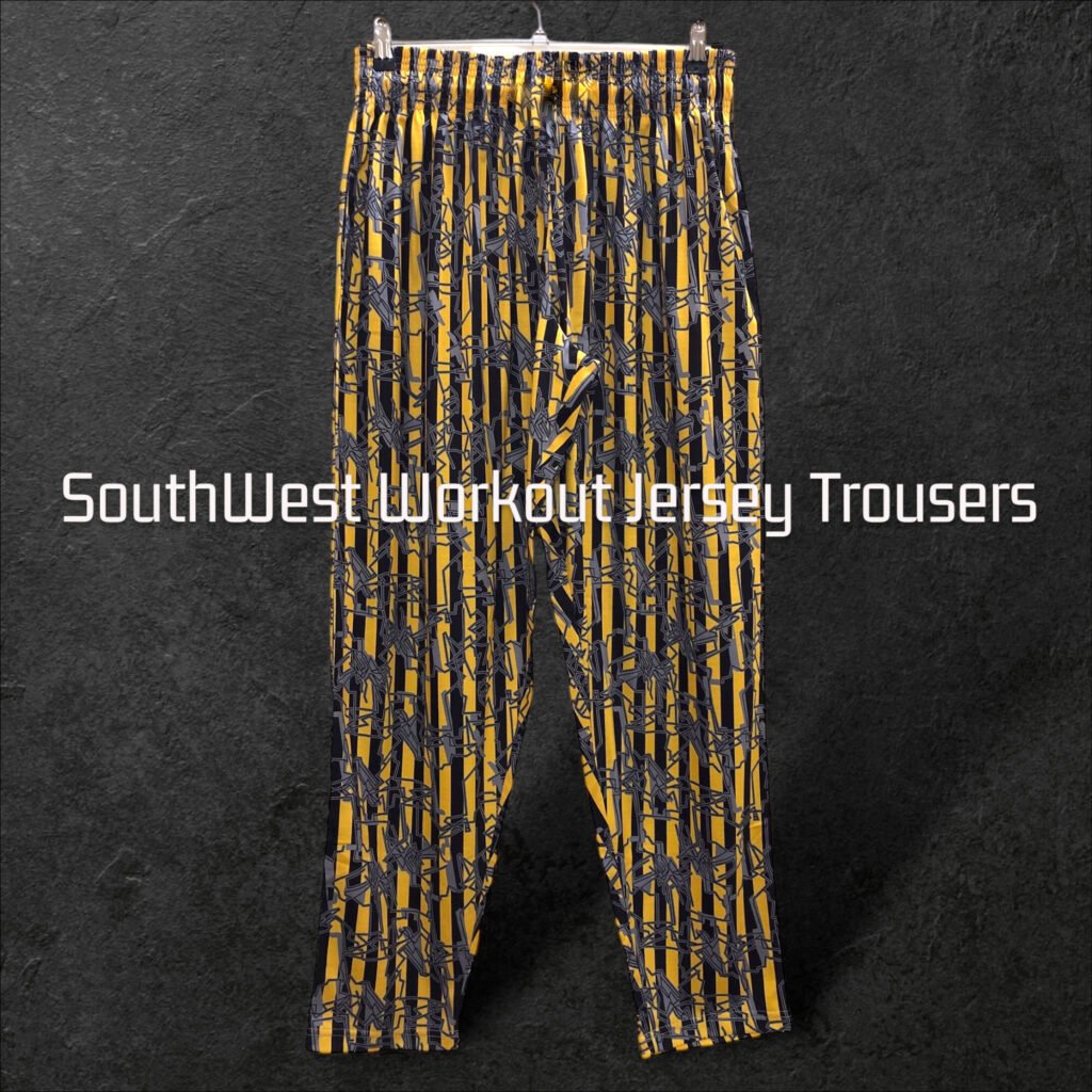 Yellow and black patterned workout trousers with tapered legs.