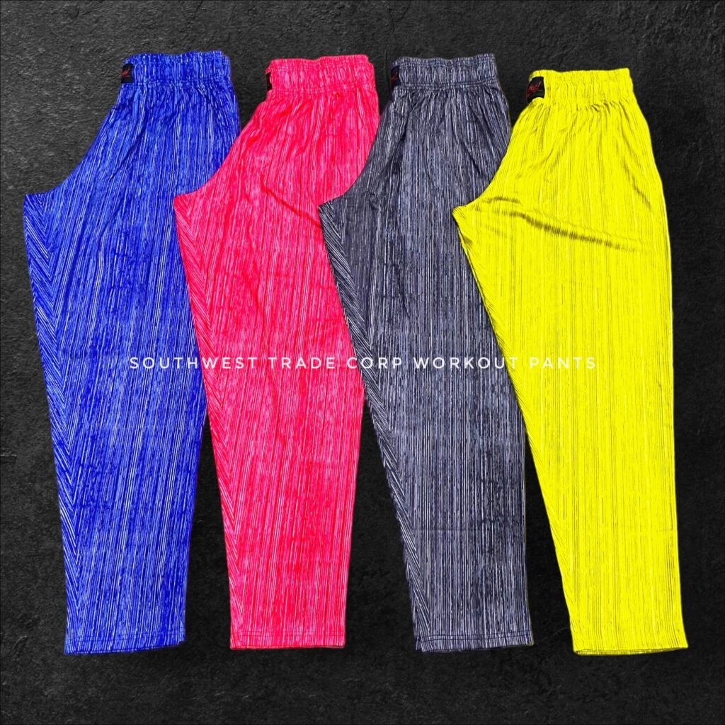 Blue, red, grey and yellow workout trousers arranged together.