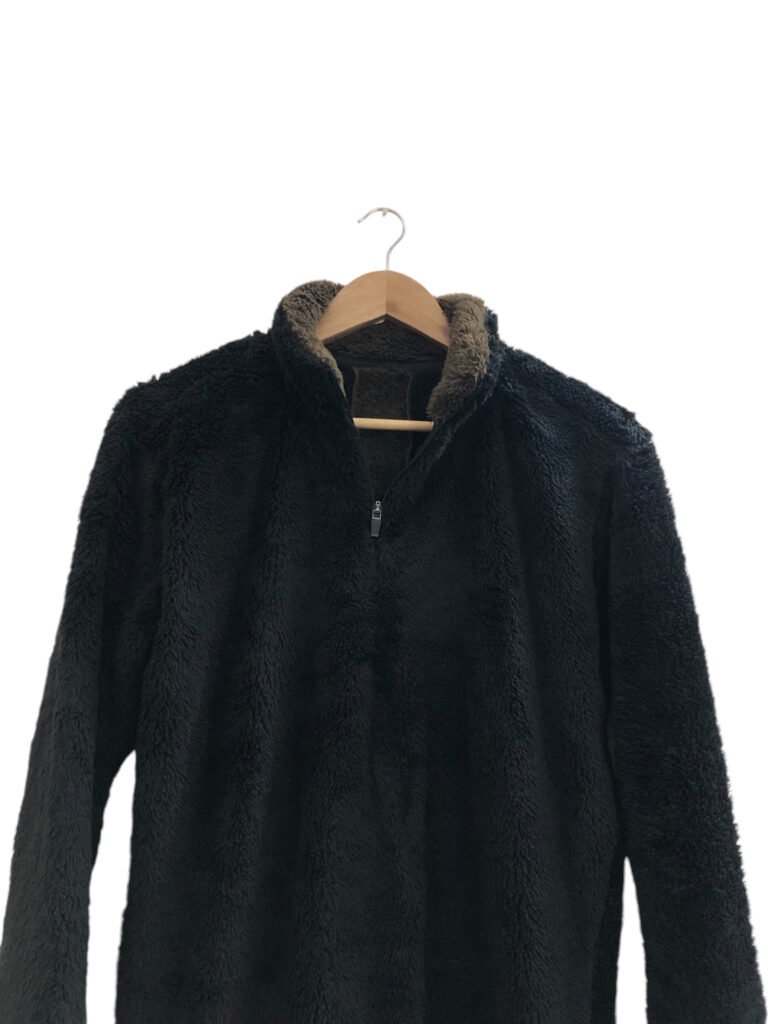 Dark grey textured fleece pullover with a quarter zip.