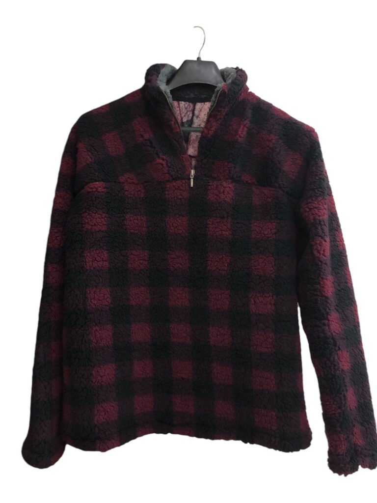 Red and black check fleece pullover displayed on a hanger.