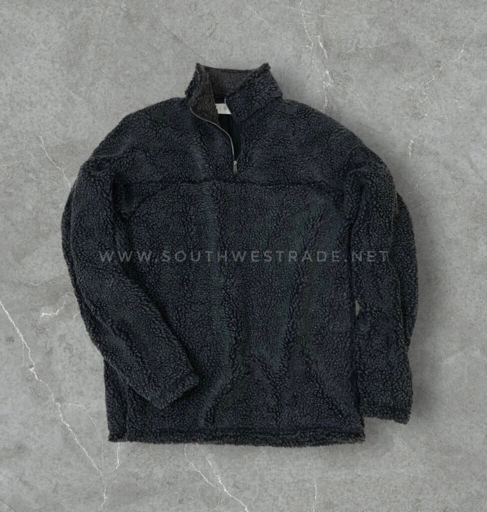 Navy textured fleece pullover with a quarter zip.