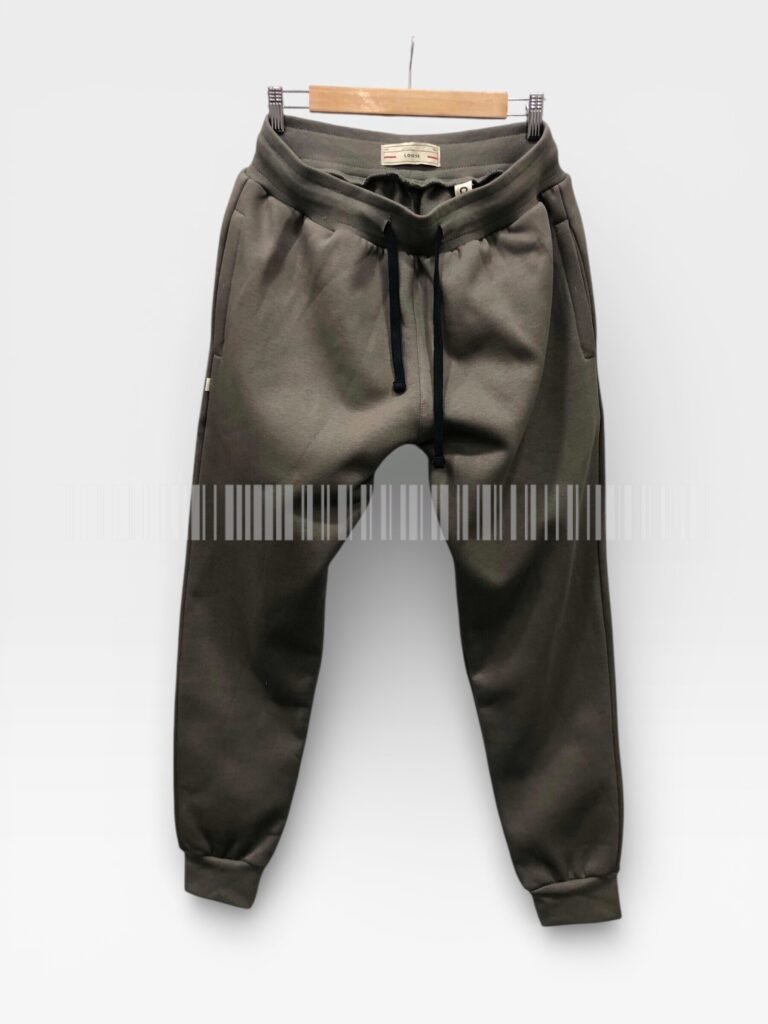 Brown joggers with pockets displayed on a hanger.