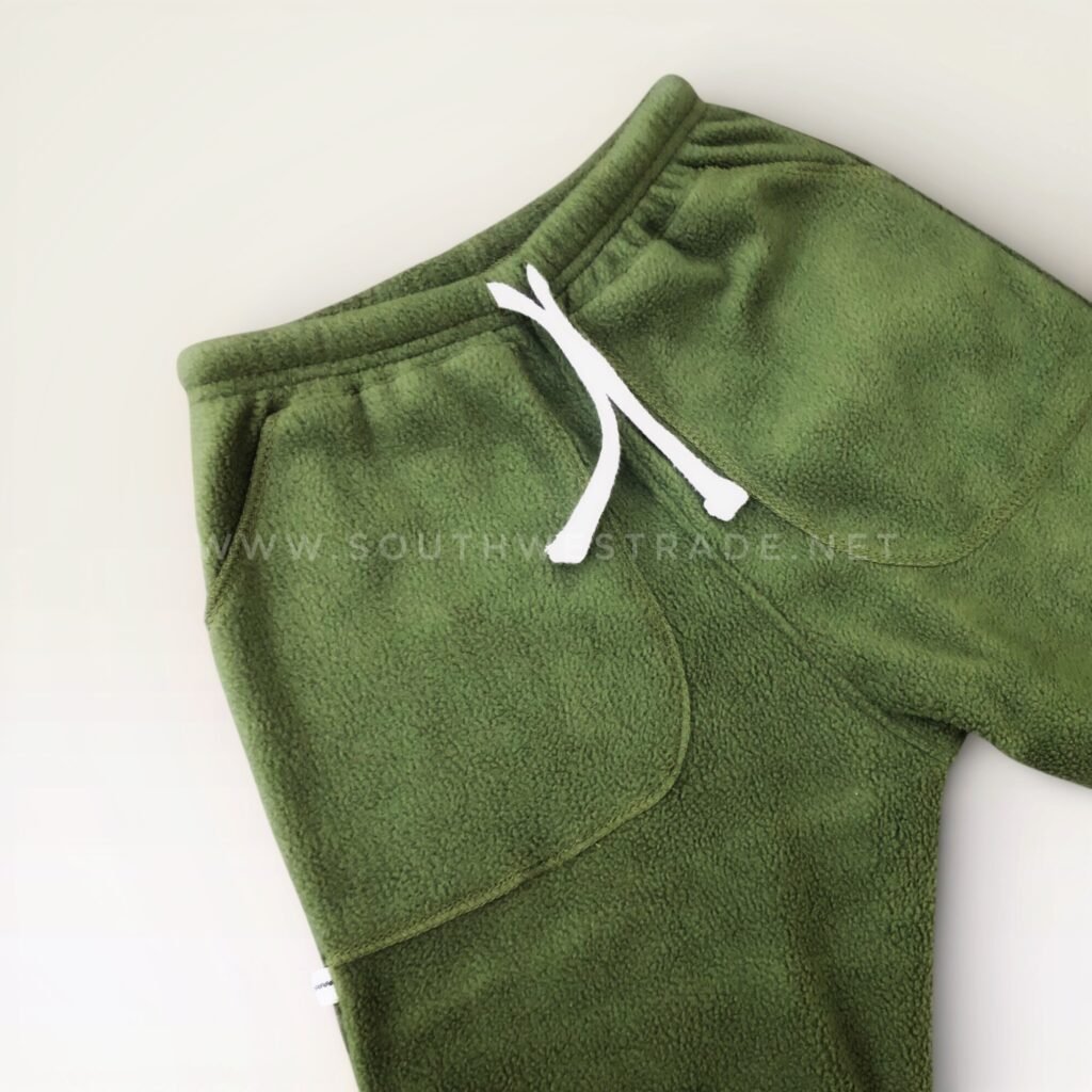 Olive green joggers with patch pockets and a white drawstring.