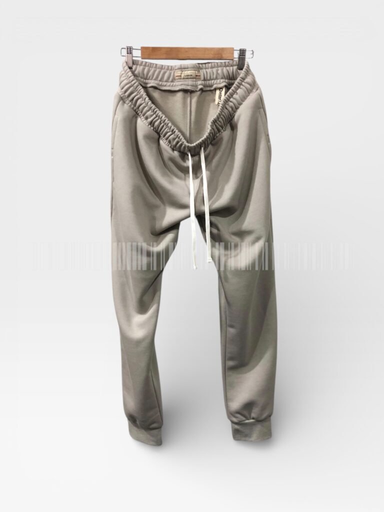 Light grey joggers displayed on a hanger.