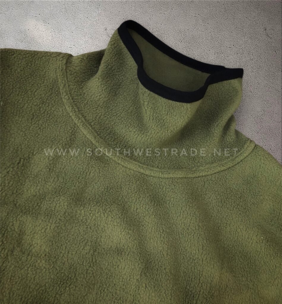 Close-up of the neckline on an olive green sweatshirt.