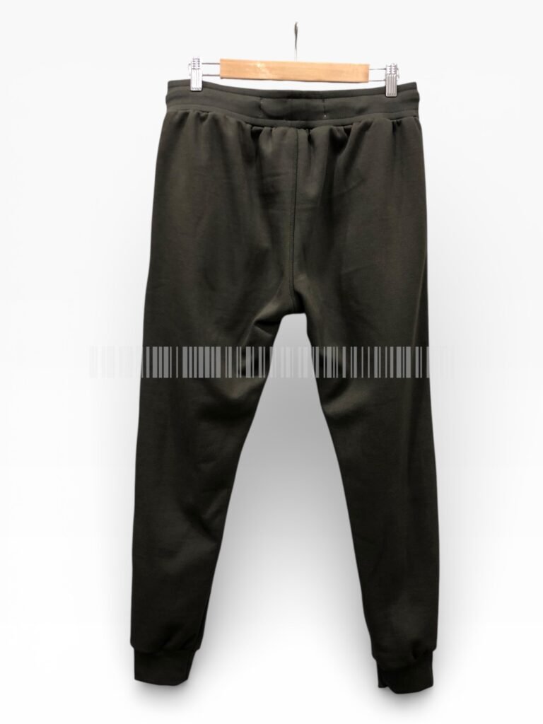 Black drawstring joggers displayed on a hanger.