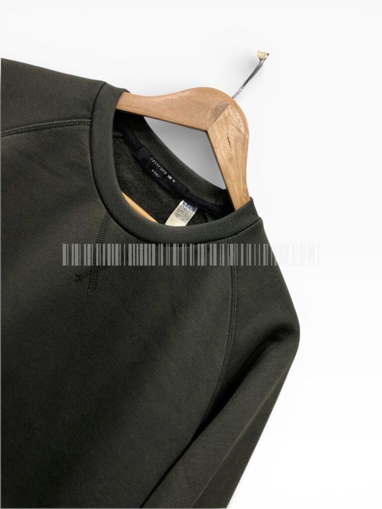 Close-up of the collar and shoulder on a charcoal sweatshirt.