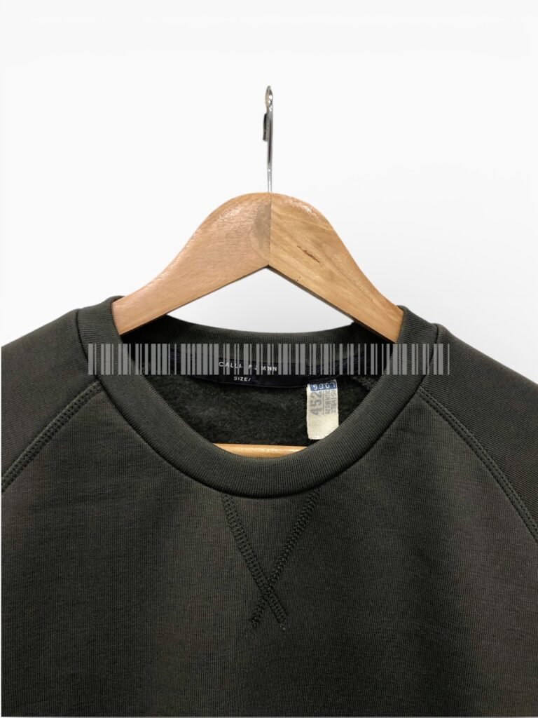 Charcoal sweatshirt neckline displayed on a hanger.
